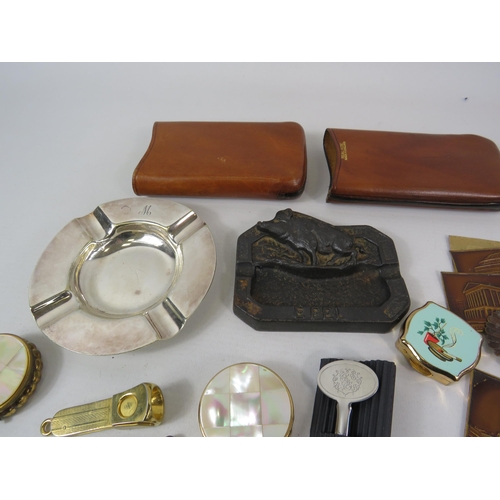 590 - Mixed smoking related lot to include travel ashtrays and cigar cutters etc.