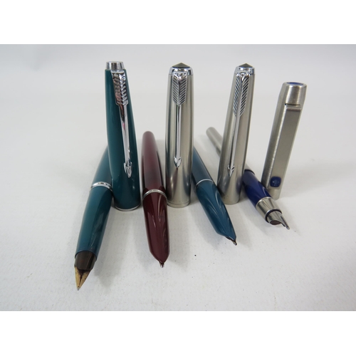 596 - 4 vintage Parker Fountain pens.