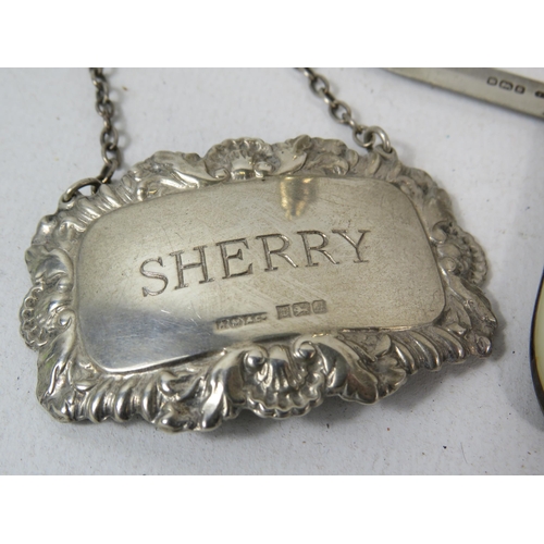 606 - Selection of Sterling silver hallmarked items including a Sherry label, pen knife, pepper pot etc.