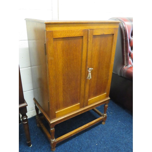 862 - Beautifully made Coin Collectors Cabinet in Light Oak with locking door and Key. 18 Ebonised drawers... 