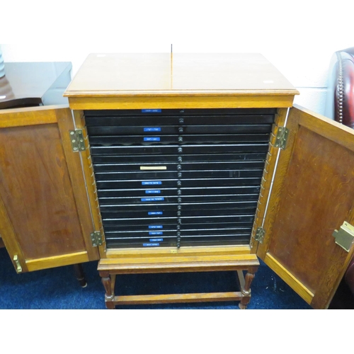 862 - Beautifully made Coin Collectors Cabinet in Light Oak with locking door and Key. 18 Ebonised drawers... 