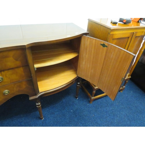 863 - Lovely Bow fronted darkwood chifonier with central drawer stack and cupboards to sides By Strongbow ... 