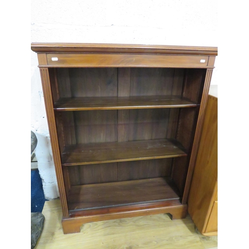 864 - Darkwood Bookcase with decorative reeded columns to sides. Raised on Bracket feet it measures H:47 x... 