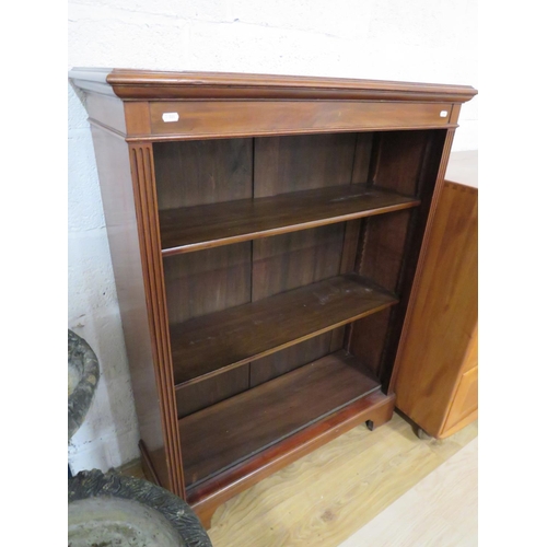 864 - Darkwood Bookcase with decorative reeded columns to sides. Raised on Bracket feet it measures H:47 x... 