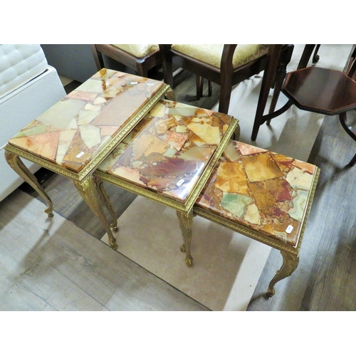 867 - Nest of Three Italian Made stacking tables with Gilt metal frames.  Each table has interesting Glass... 