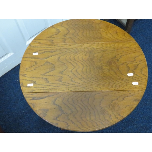 870 - Oak Drop leaf table with turning top. H:18 x W:24 x D:24 Inches. S2