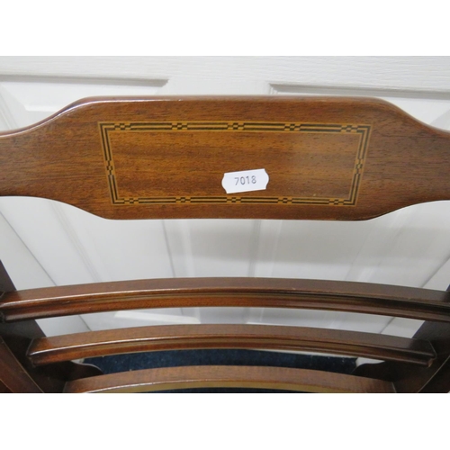 872 - Four Nicely made Darkwood chairs in the Edwardian style , Inlaid decorations to the backrest. Sprung... 