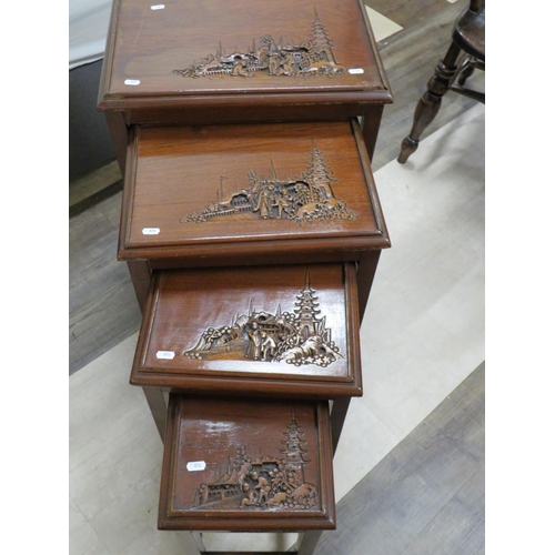 876 - Nest of Four, Oriental style hardwood tables, each with carved oriental decoration to corners and si... 