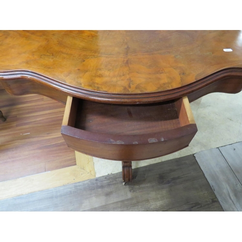 879 - 19th Century Mahogany veneer table raised on four scrolled feet with original castors on turned cent... 