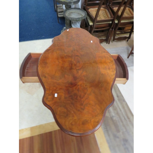 879 - 19th Century Mahogany veneer table raised on four scrolled feet with original castors on turned cent... 