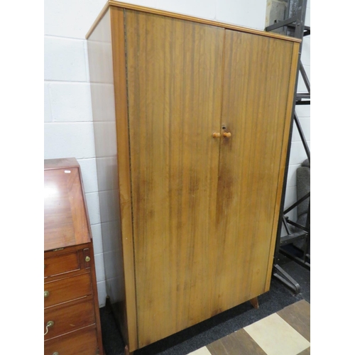 881 - Cumbrae Mid Century Teak Wardrobe in good order. Enclosed shelves to one side. Measures H:72 x W:42 ... 