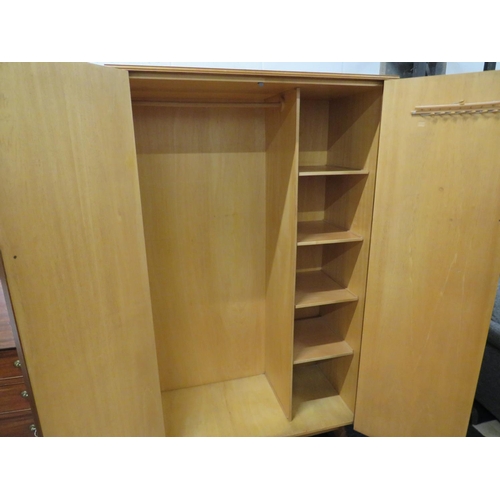 881 - Cumbrae Mid Century Teak Wardrobe in good order. Enclosed shelves to one side. Measures H:72 x W:42 ... 