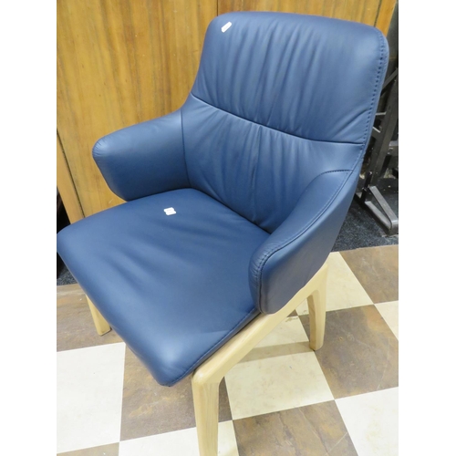 883 - Lovely Ash Framed adjustable spring return chair by Stressless of Scandinavia. Upholstered in lovely... 