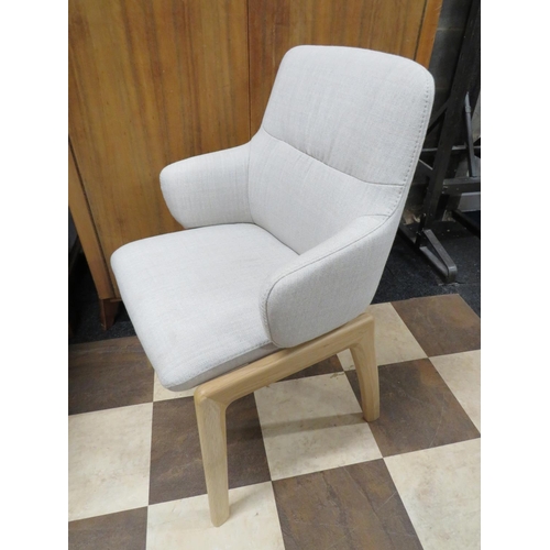 884 - Lovely ash Framed adjustable spring return chair by Stressless of Scandinavia. Upholstered in high q... 