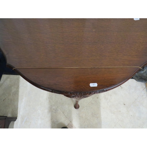 891 - Oak Demilune hall table with tapered legs and carved fan shaped decoration to tops of legs. Large sp... 