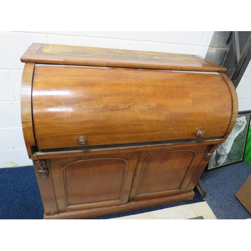 895 - Edwardian Era Barrel topped desk. Satinwood inner drawers and pull out leather topped writing slope.... 