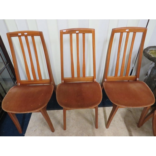 904 - Set of Four Mid 20th Century upholstered  Teak Dining chairs.  See photos. S2