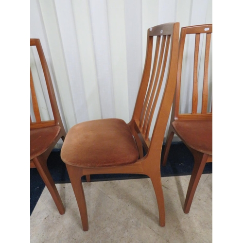 904 - Set of Four Mid 20th Century upholstered  Teak Dining chairs.  See photos. S2