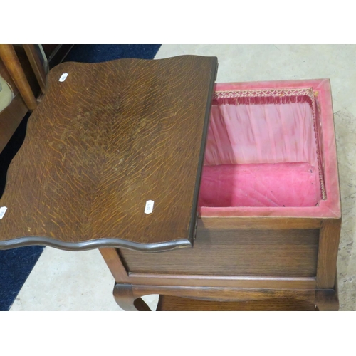 908 - Early 20th Century Oak Sewing table with pivot top. Pink silk and velvet lining. Shelf under .  H:26... 