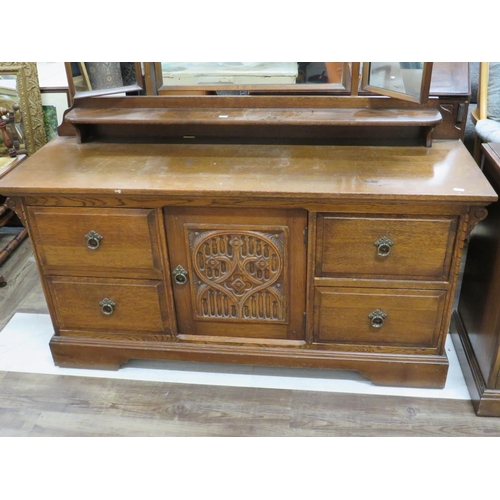 921 - Early 20th Century Oak Dressing table with central tilting mirror and two side mirrors. Well constru... 