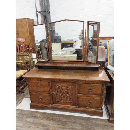 921 - Early 20th Century Oak Dressing table with central tilting mirror and two side mirrors. Well constru... 