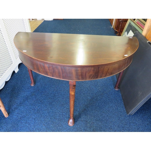 926 - Interesting Georgian/Victoran demilune table raised on three tapered legs with paw feet. May have on... 