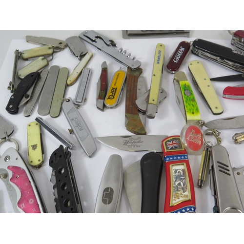 629 - Large selection of Penknives, Swiss army style penknives etc.