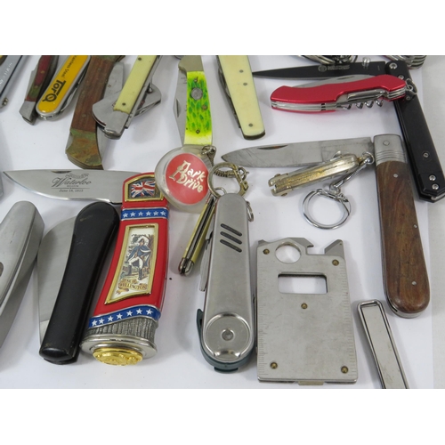 629 - Large selection of Penknives, Swiss army style penknives etc.