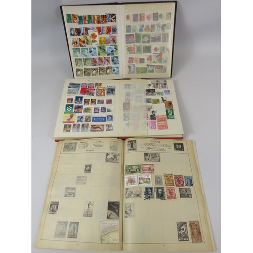 642 - 3 small stamp albums of various world stamps.