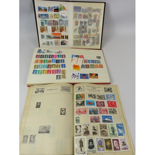 642 - 3 small stamp albums of various world stamps.