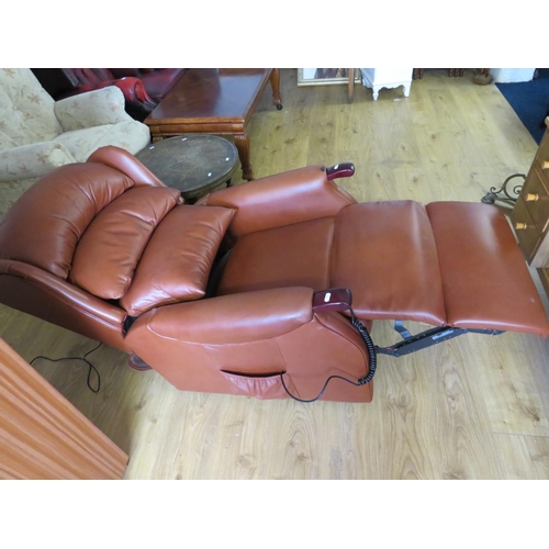 940 - Very Comfortable Single motor electric Rise/Recline armchair.  Soft brown leather, slight rubbing to... 