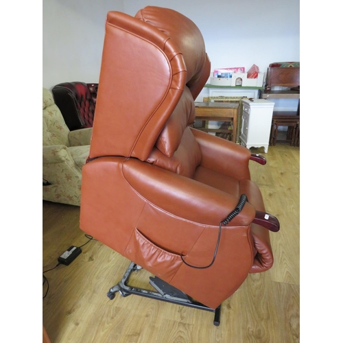 940 - Very Comfortable Single motor electric Rise/Recline armchair.  Soft brown leather, slight rubbing to... 