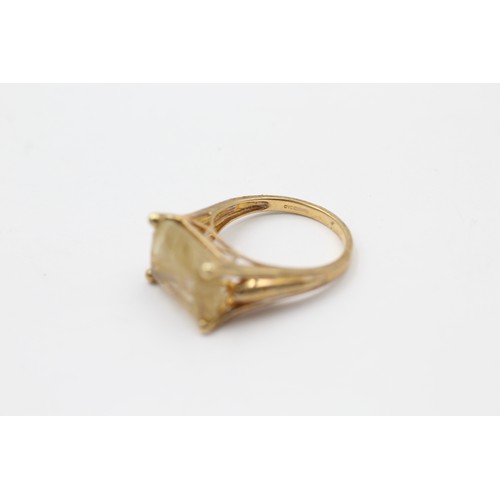 318 - 9ct gold rutile quartz solitaire ring (3.6g)     737610
Finger Size 'L'