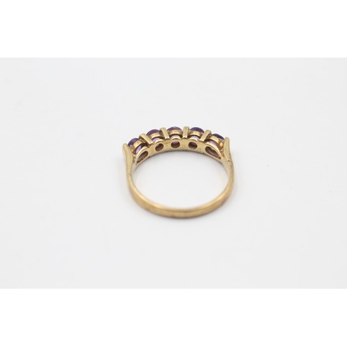 321 - 9ct gold amethyst five stone ring (2.4g)     737630
Finger Size 'O'