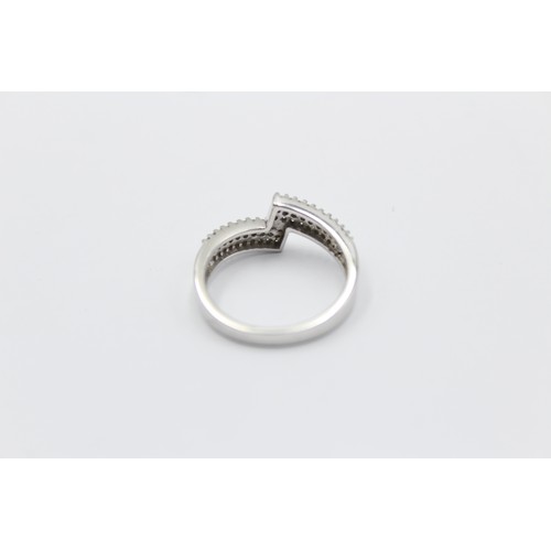 338 - 9ct white gold diamond bypass ring (3g)     788873
Finger Size'O'