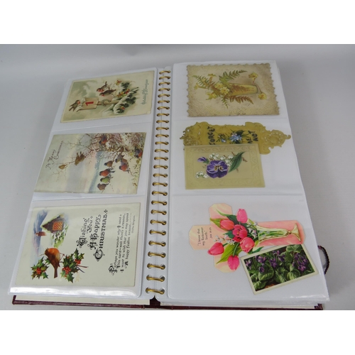 689 - Album of vintage greeting cards, silks, boomarks etc.