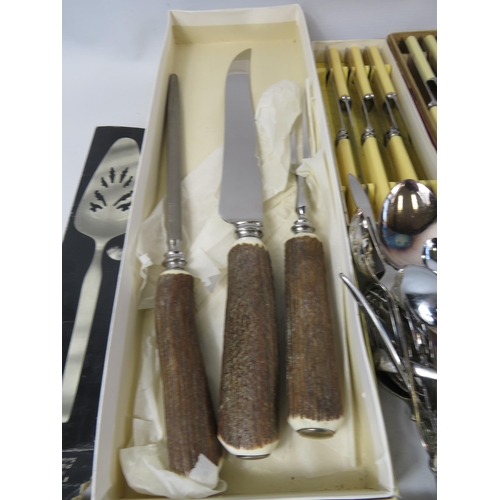 701 - Large selection of mainly boxed vintage cutlery including a Antler handle meat carving set and butte... 