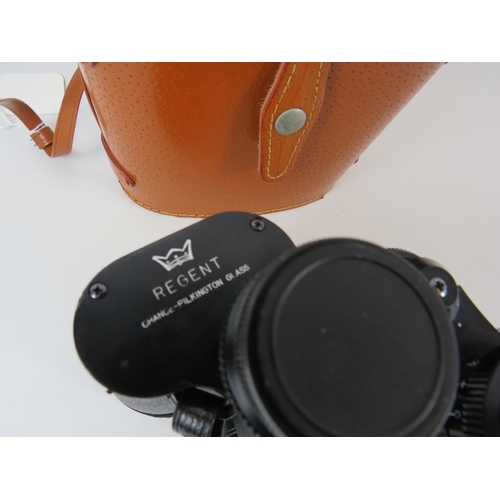 705 - Pair of Regent 10x50 Field binoculars with leather case.