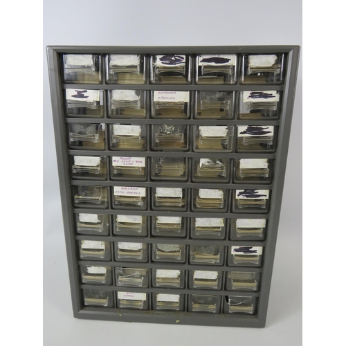 708 - 45 draw plastic storage container with a large quantity of cigarette cards within.