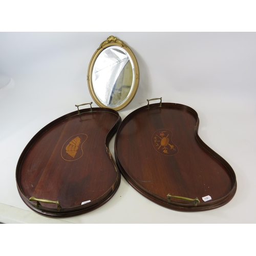 713 - 2 Vintage kidney shaped wooden trays. Both have slight damage. Plus a small oval bevel edge mirror.