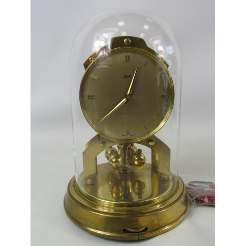 725 - Schatz and son German glass domed 1000 day anniversary clock in running order.