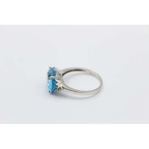 352 - 9ct white gold topaz solitaire ring with diamond accents (3g)     788870   Finger Size'N'