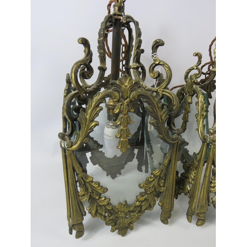 757 - Pair of heavy brass ornate light fittings with glass panels. 17.5