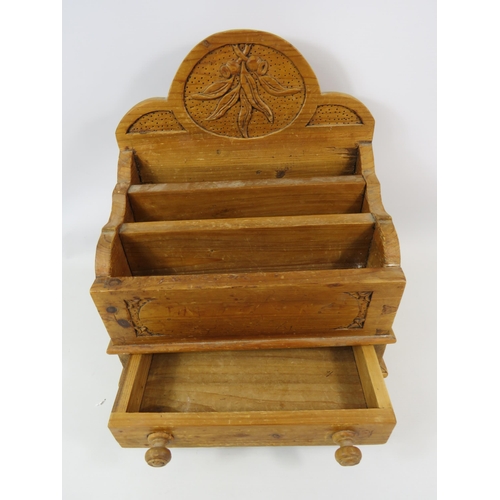 767 - Large carved wooden waterfall letter rack with draw below.