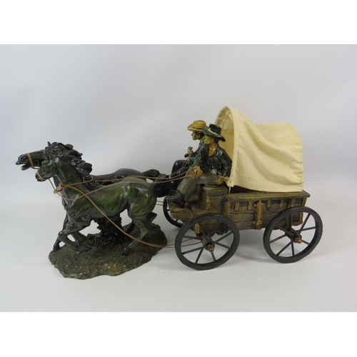 772 - Large resin figurine of a cowboy horse and carriage. 20.5