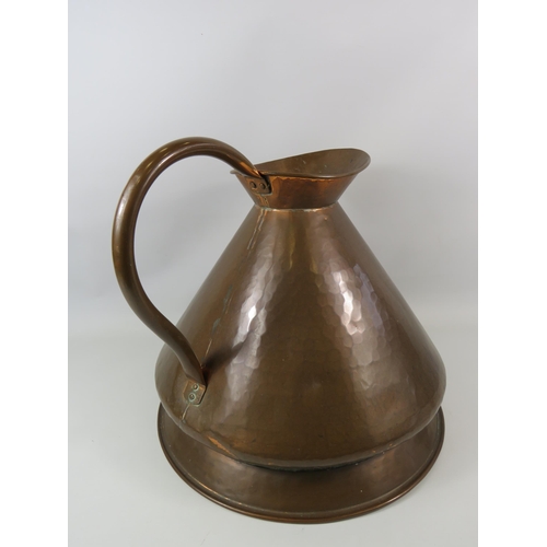 774 - Very large hammered copper jug with handle. 15