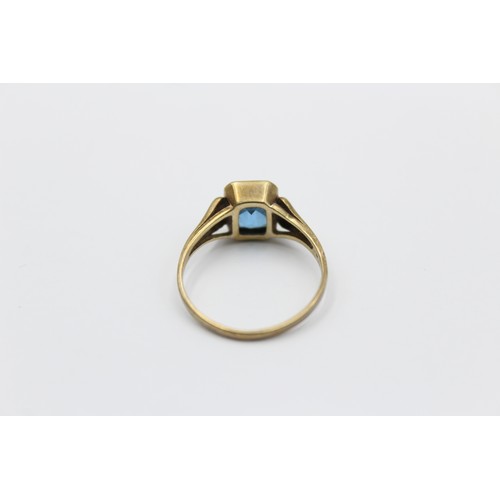 356 - 9ct gold blue synthetic spinel solitaire ring (2.2g)     788868 Finger Size 'Q'