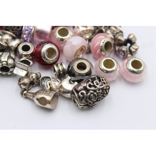 403 - 40 X .925 Mixed Charm Brand Charms (104g)     698229