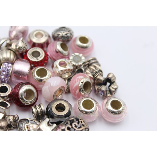 403 - 40 X .925 Mixed Charm Brand Charms (104g)     698229