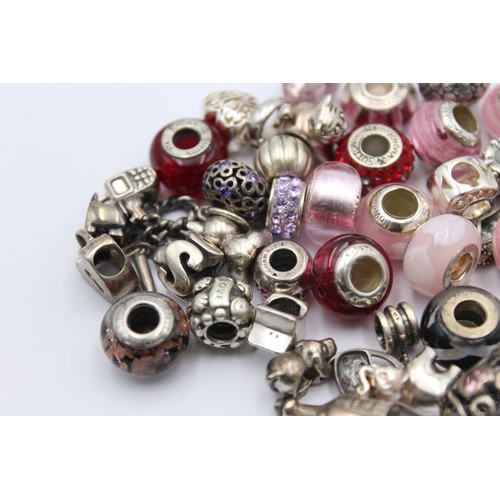 403 - 40 X .925 Mixed Charm Brand Charms (104g)     698229